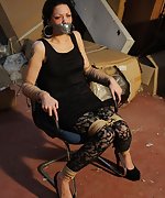 Distressed damsel chair-tied and tape-gagged