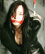 Black catsuit, ropes and cleave gag
