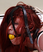 Redhead in her first hogtie bondage
